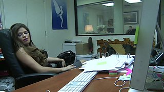 Busty darkhaired secretary receives passionate office attention from her boss