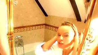 Hot babe with perfect big boobs taking shower