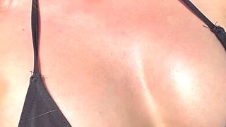 Busty curly brunette with big boobs fucks on couch