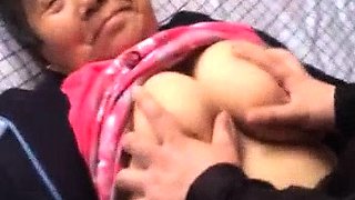 Curvy Chinese granny getting her big natural tits caressed