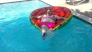 Short Video of BBW Nurse Vicki Floating on Her Huge Watermelon