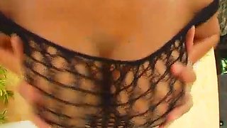 Mary shows us her big set of tits through a full body net.