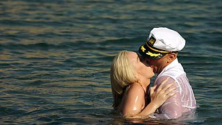 Kendra Sunderland rides a big dick on the beach with stunning tan lines.