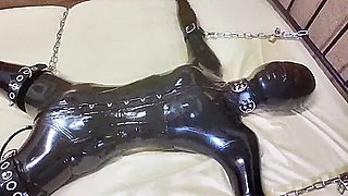 Asian Rubber Sissy in Tight Latex Suit Gets Breathplay Punishment