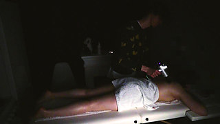 body and foot massage with a massage gun and hands