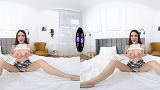 Hot brunette with long hair fingers her shaved pussy in a skirt