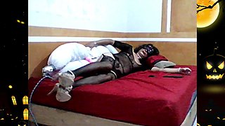 Torrid Halloween, lounging down, the black kitten gets pulverized