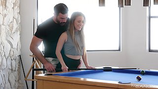 Cute teen enjoys more than just a game of pool