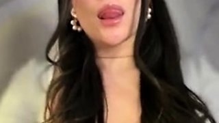 Busty curly brunette with big boobs fucks on couch