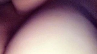 A super sexy brunette massages her big boobs