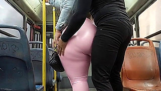 Balaclava BBW Gets Ass in Tight Shiny Pink Pants - Public Bus