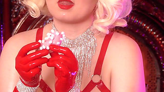 Sexy glamour pin up hot blonde eating in opera long latex rubber gloves