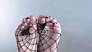 Beautiful feet covered in cum on a rainy night