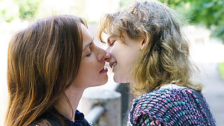 Skinny brunettes kiss deep, scissor, and eat pussy on couch