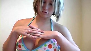 Busty Teen with a Bootylicious Figure rubs on Sunscreen seductively