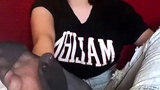 Cute teen girl enjoys foot fetish