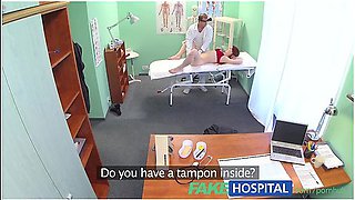Sexy redhead surprises a doctor with what is inside her pussy
