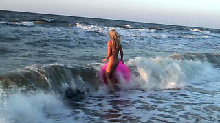 Hot naked blonde on the beach