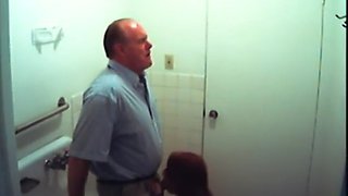 Bathroom slut sucks dick in restroom