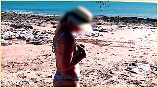 Wifey flashing her tits at the beach in a public exhibitionist dare.