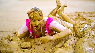 German teen masturbates to orgasm in muddy lake - wet and messy solo fingering