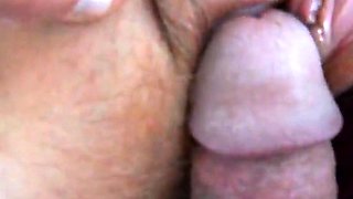 parting her panties to show hairy pussy and hard clit