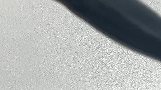 Hot Domme Redhead Teases in Latex Opera Gloves and Thigh High Boots