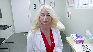 Mature London lass in a red skirt teases with her massive melons and long locks