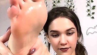 Flexible pale brunette with foot fetish does hot footjob