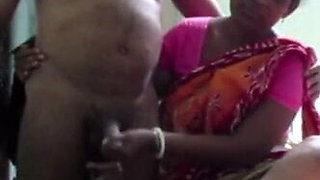 Indian Aunty in a Saree Jerking Dick