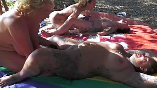 Squirting Lesbian Foursome in the Sun