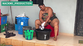 African Mama Multitasks on a Sunday Morning