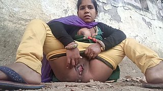 Indian Desi Bhabhi fingering outdoors