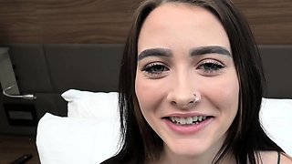This petite teen with gorgeous green eyes sucks a fat dick