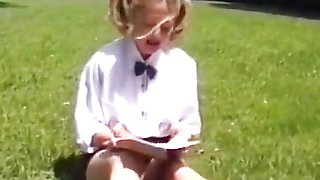 A college girl with blond duvets gets fucked on the lawn.