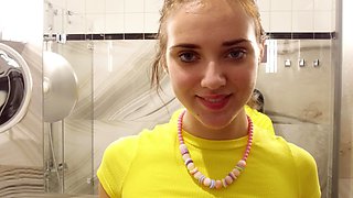 Teen Oxana's steamy bath time