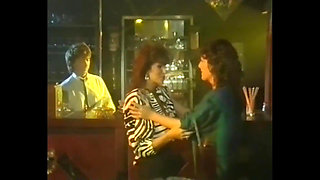 Milf brunette having fun with two cocks