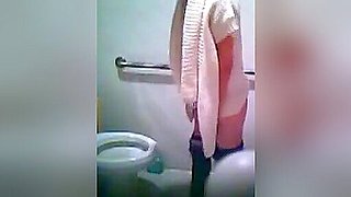 Asian girls pissing in a school toilet filmed on camera