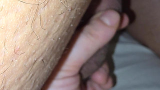 Step mom hand milking step son balls under blanket without shame