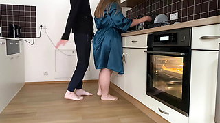 Horny mother-in-law and son-in-law masturbate together in the kitchen