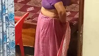 Aunty caught red handed on camera while changing dress.