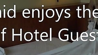 Maid Enjoys Belongings of Hotel Guests