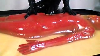 Kinky Japanese babe in latex is made to cum with a vibrator