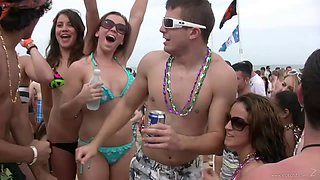 Appreciative cowgirl with big ass in bikini dancing in the beach party outdoor